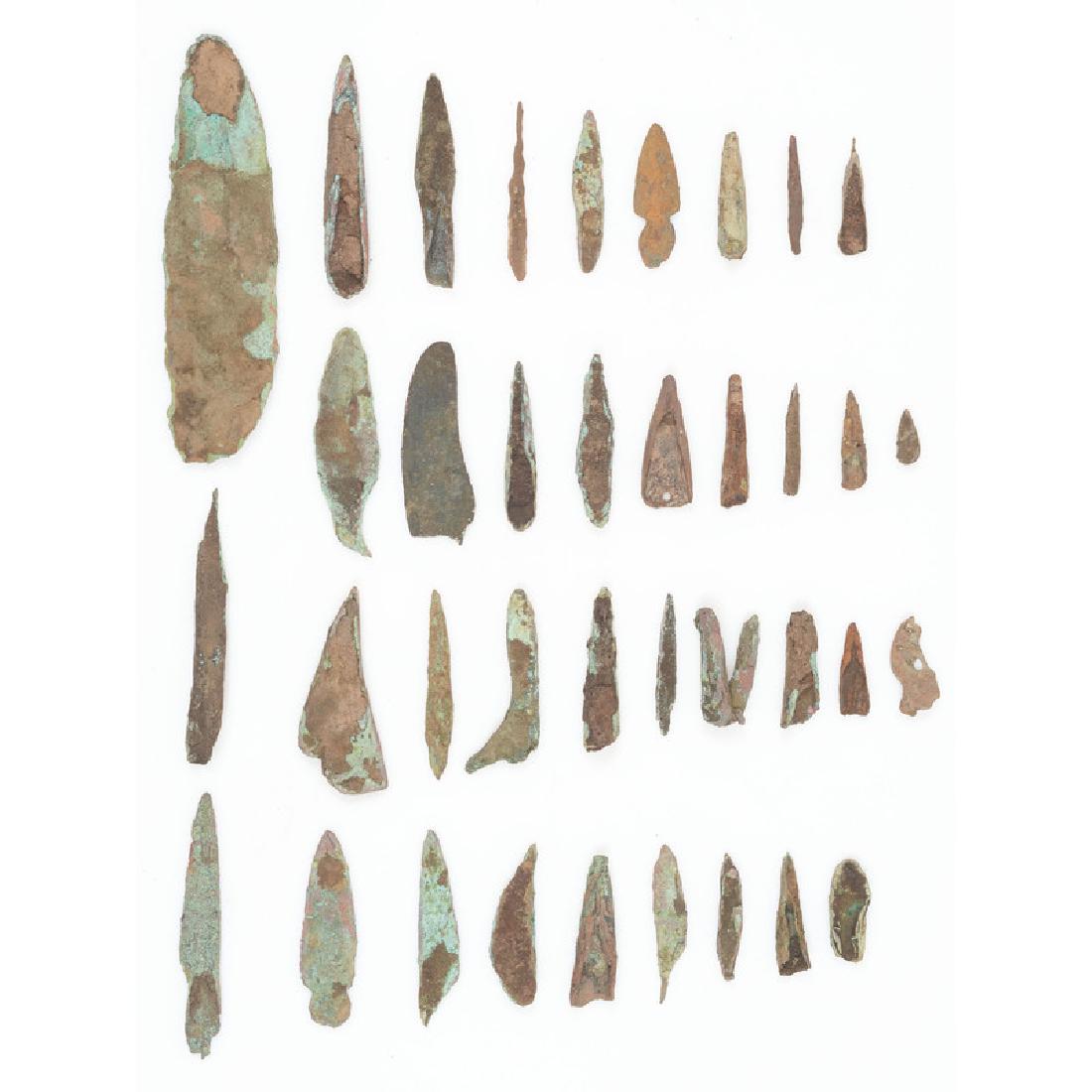 An Assortment of Old Copper Culture Tools: From the Collection of Roger "Buzzy" Mussatti, Michigan Old Copper Culture, 7000-3000 B.C. Vilas County, Wisconsin Gogebic County, Michigan lot of 37, longest 6 in.