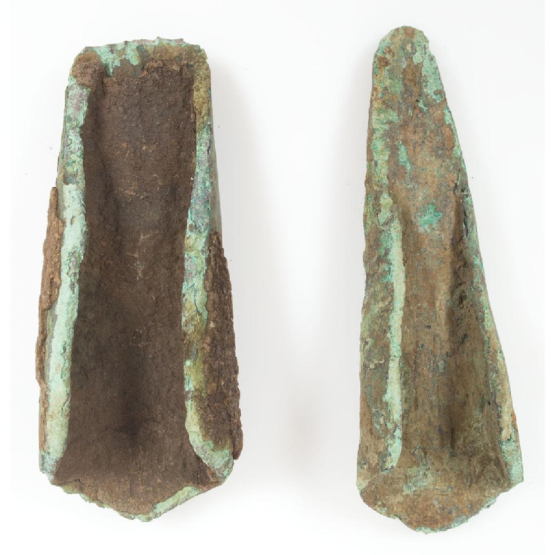 A Pair of Old Copper Culture Socketed Chisels: From the Collection of Roger "Buzzy" Mussatti, Michigan Old Copper Culture, 7000-3000 B.C. Okanogan County, Wisconsin lot of 2, longest 3.75 in.