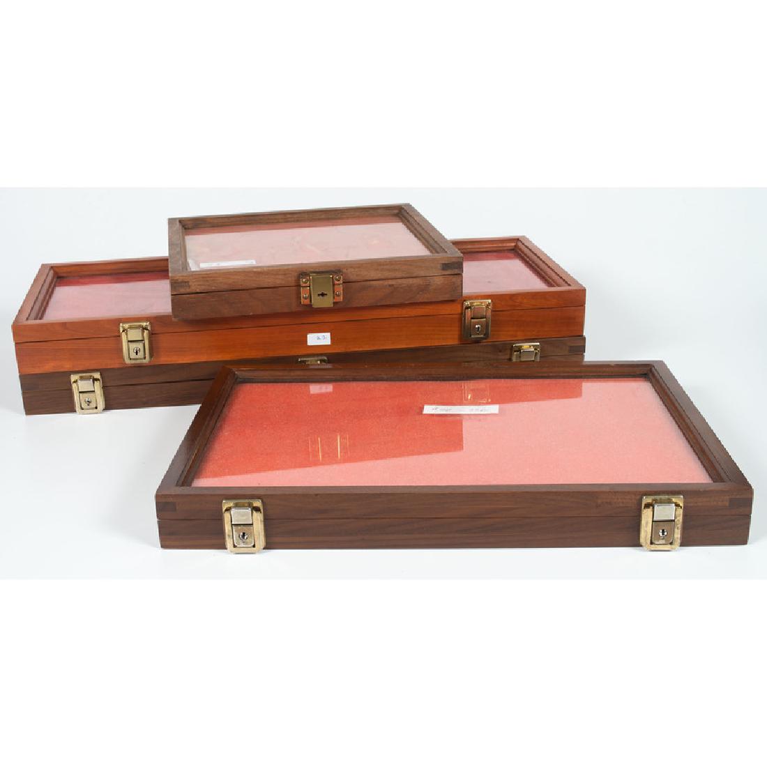 Four Wood and Glass Display Frames: From the Collection of Jon Anspaugh, Wapakoneta, Ohio lot of 4, sizes include: height 2-1/8 in. x length 24 in. x width 9-1/4 in. height 2 in. x length 24 in. x width 10 in. height 2 in. x length 12 i