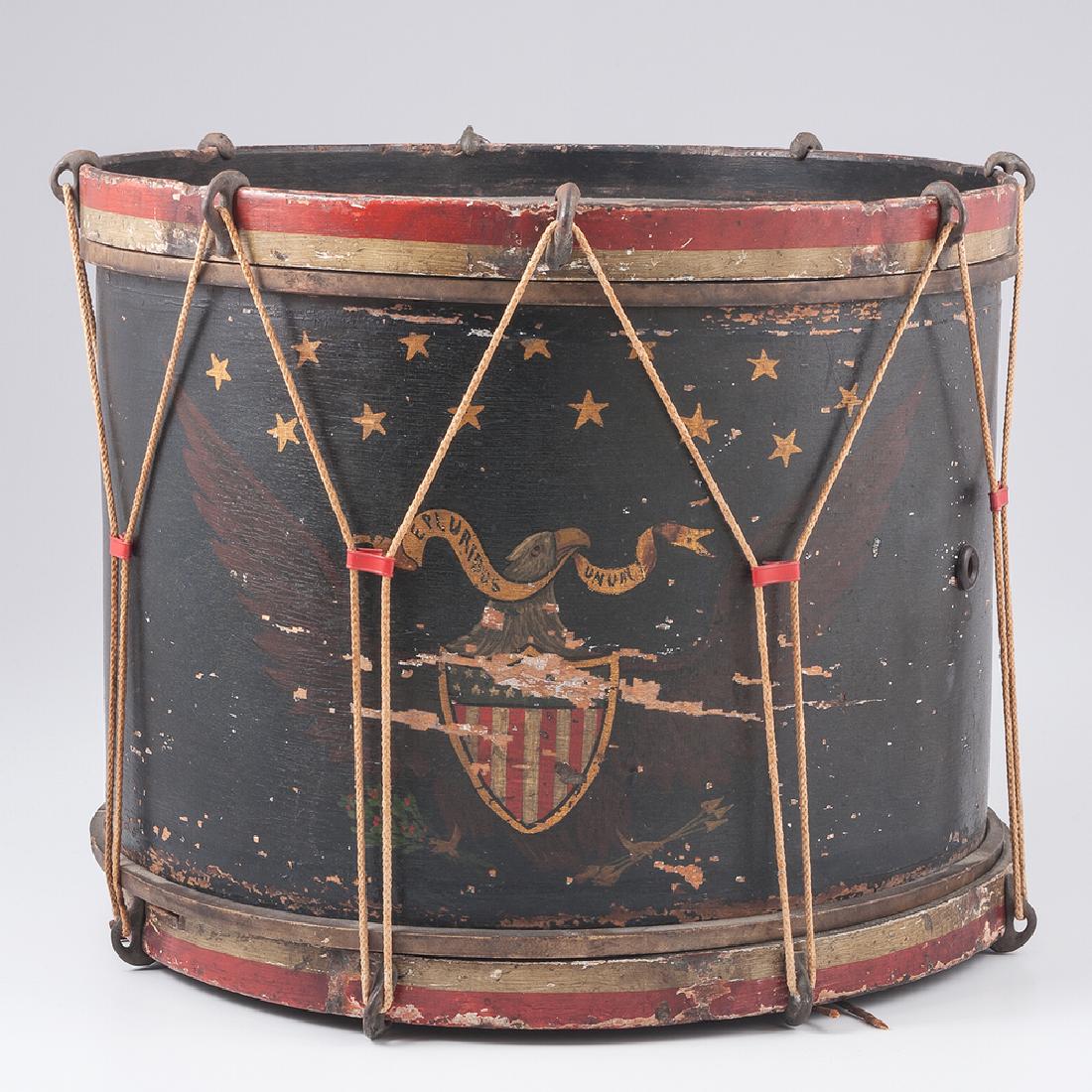 19th Century Drum by John C. Haynes & Co.: 19th Century Drum by John C. Haynes & Co. Snare drum, 16.5 in. dia, 13.75 in. ht., with red and white painted wood counterhoops, with rope tensioners, replaced plastic tugs, and six-string gut snare. 