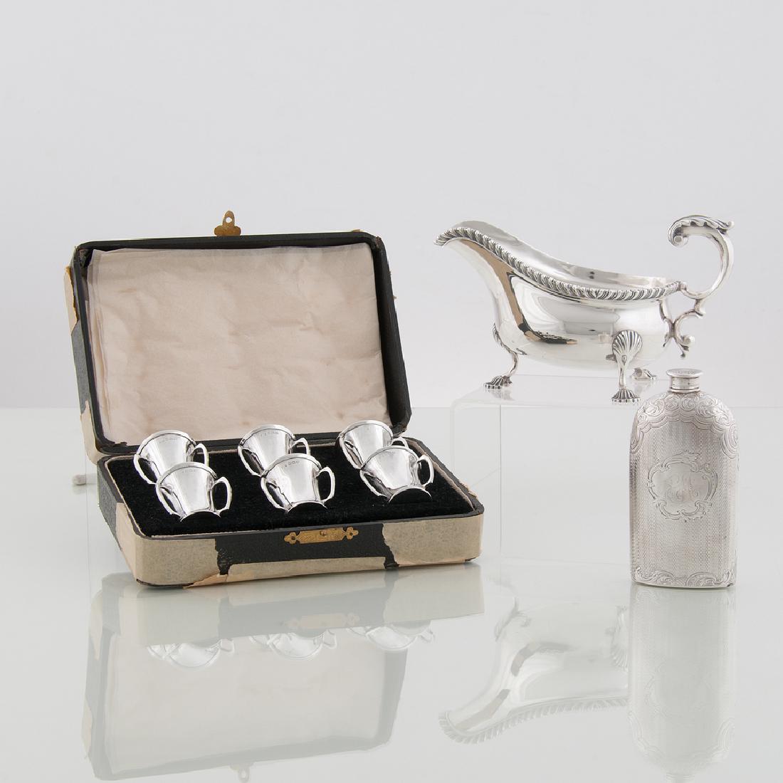 English Sterling Hollowware: English Sterling Hollowware English, 19th-20th century. Eight pieces of sterling hollowware, including one gravy boat by Charles Stuart Harris with London hallmarks, one flask by unknown maker with Bi