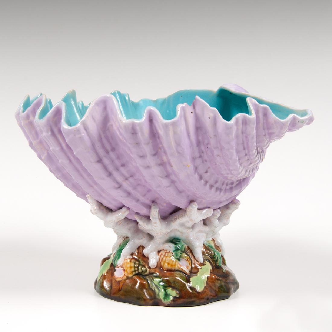 George Jones Majolica Shell Compote: George Jones Majolica Shell Compote British, ca. 1875. A George Jones Majolica compote in the form of a shell supported by stylized coral and rock base, unmarked; ht. 8.5, wd. 11.5, dp. 10.25 in.