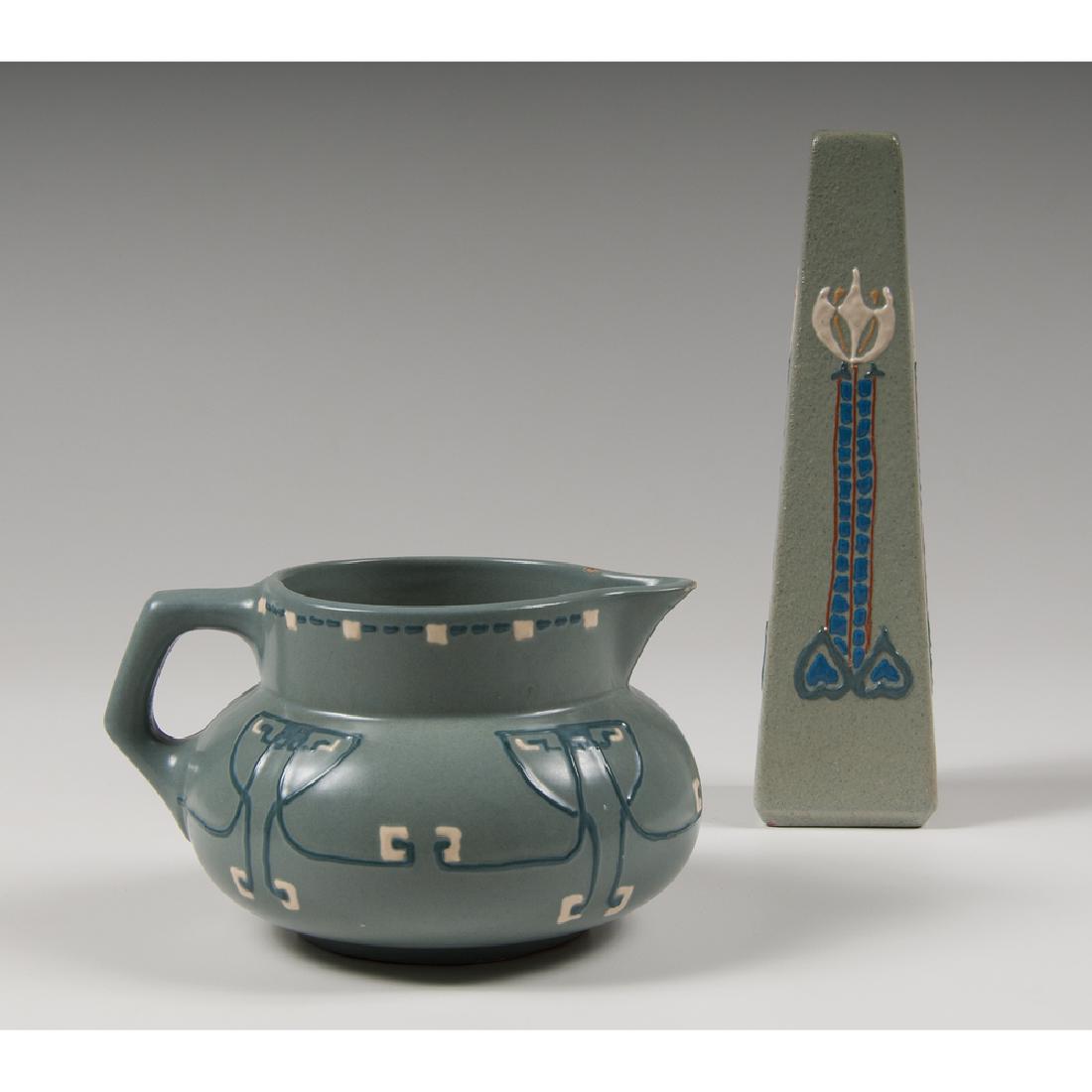 Roseville Pottery Vase and Pitcher, Aztec: Roseville Pottery Vase and Pitcher, Aztec American, 20th century. Two pieces by Roseville Pottery in the Aztec pattern, including one four-sided vase with raised circle embossed Rozane Ware on undersi