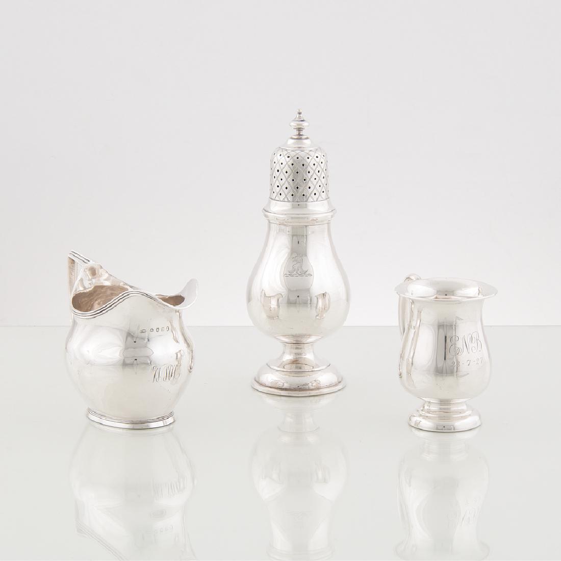 British and American Sterling Hollowware: British and American Sterling Hollowware British and American, 19th-20th century. Three pieces of sterling silver hollowware, including a George III creamer probably by John Merry with 1806 date lette