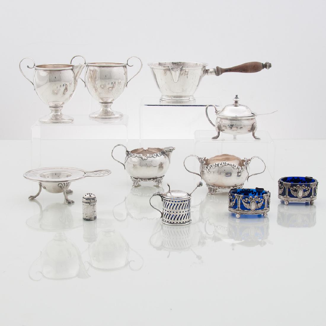 American and British Sterling Tablewares, Plus: American and British Sterling Tablewares, Plus American and British, 19th-20th century. Ten sterling tablewares by various makers, including two creamer and sugar sets, one pipkin with wooden handle m