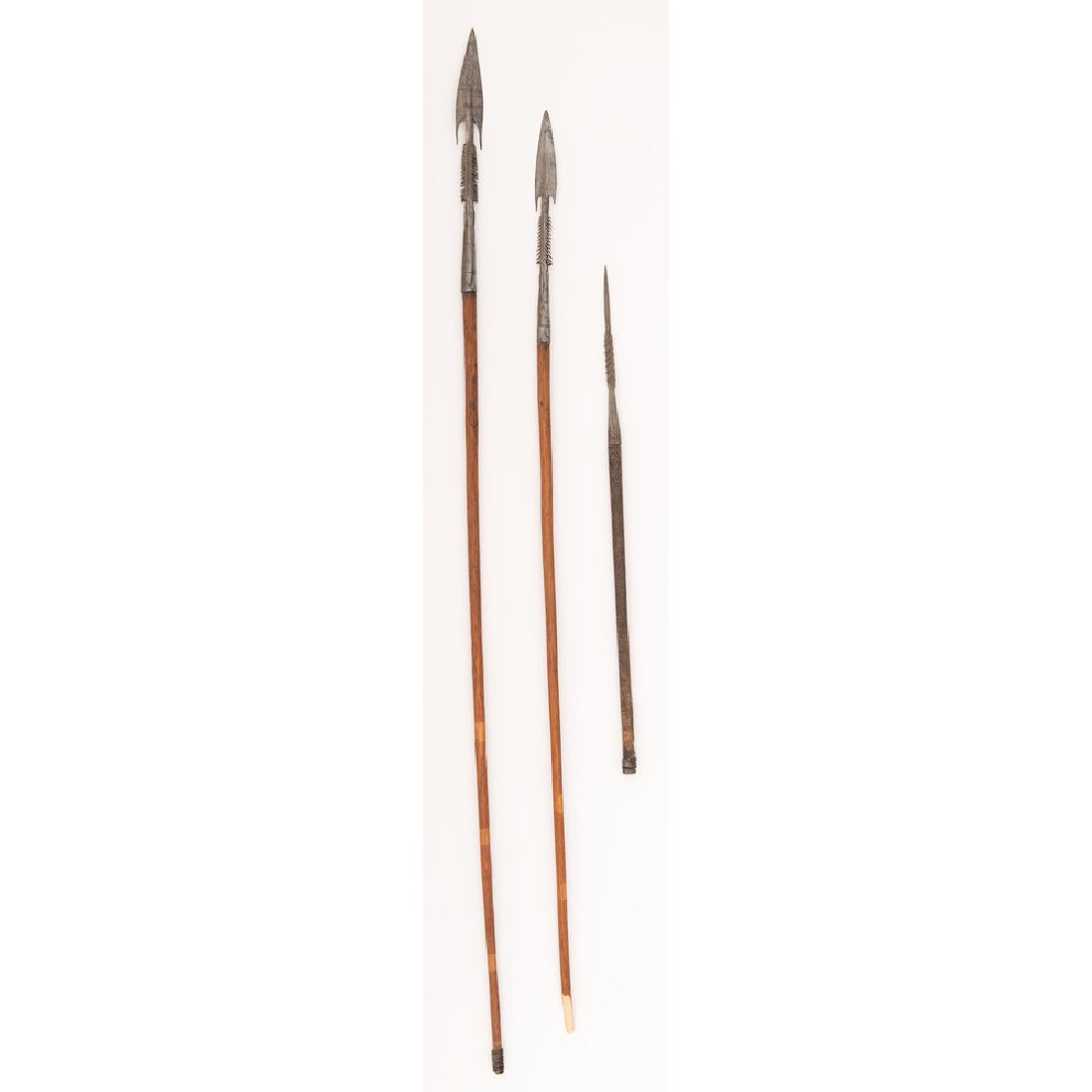 Lot of African Spears: Lot consists of three barbed African spears of types commonly used by the Zande people of North Central Africa. Longest measures 49.75". One shaft wrapped in reptile skin.