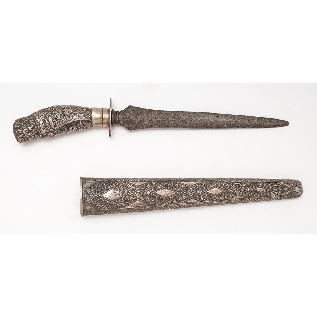 Tombak, Indonesia Spearhead Dagger: Originally a spearhead converted into a dagger. Handle and scabbard are silver. Late 19th Century.