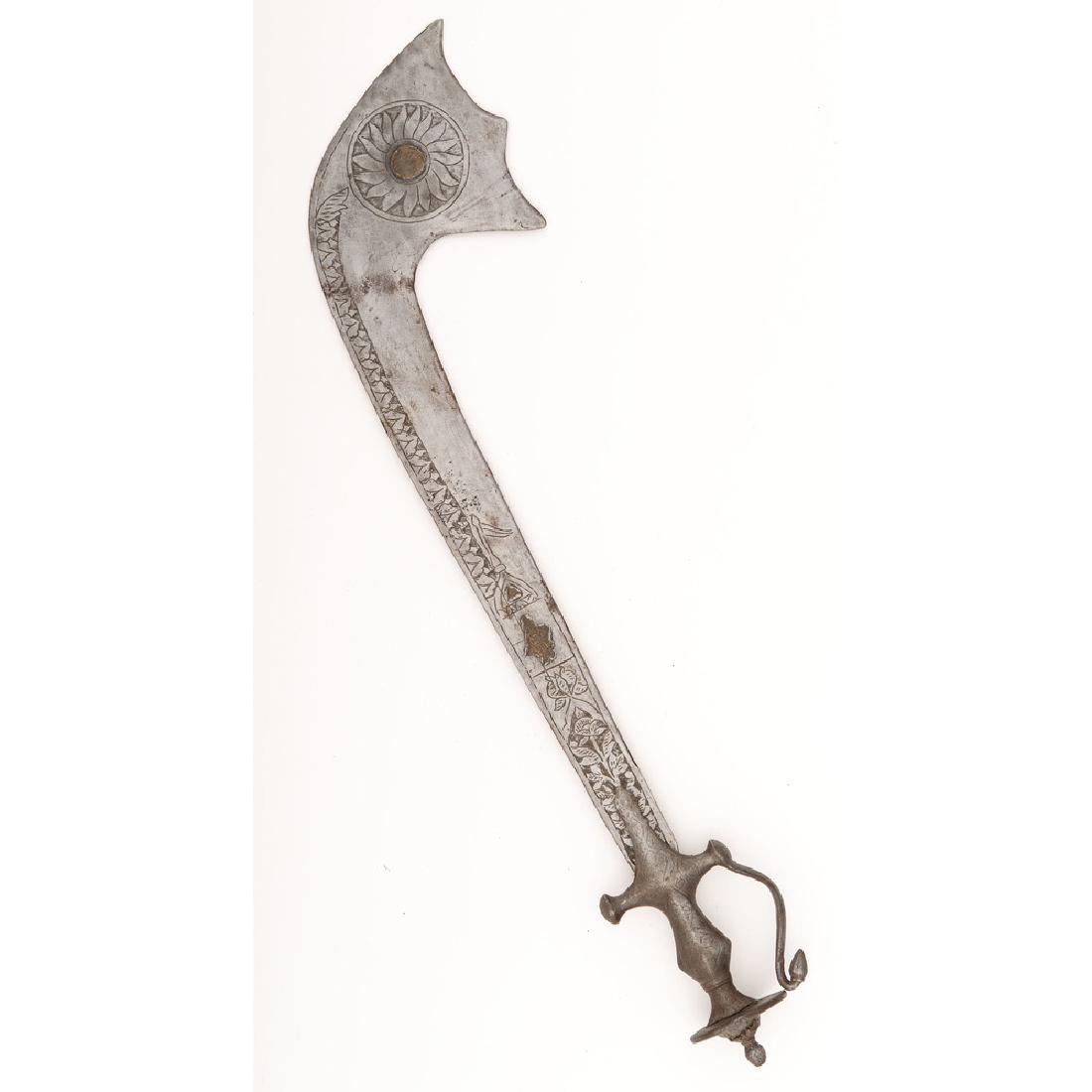 Tulwar Hilted Kora: 27" overall length. This item was primarily used a sacrificial tool commonly found in the Bengal/Nepal area. Ca 19th Century.