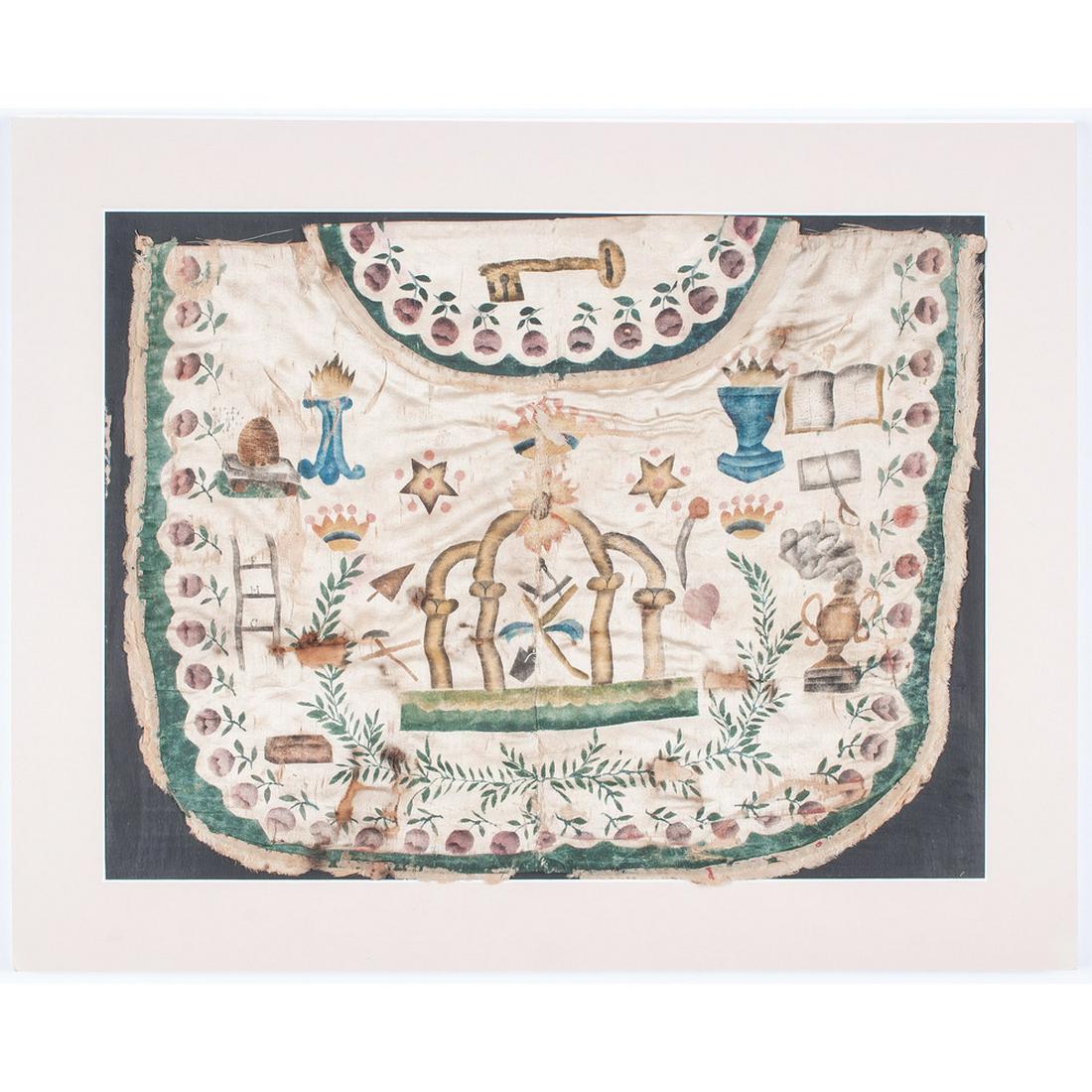Early Hand-Painted Silk Masonic Apron: American. A framed silk apron with painted motifs including flowers, a key, a book, a beehive, a crown, the Mason's compass, various tools, and a ladder with the letters FHC; 12.5 x 16.5 in. (frame).
