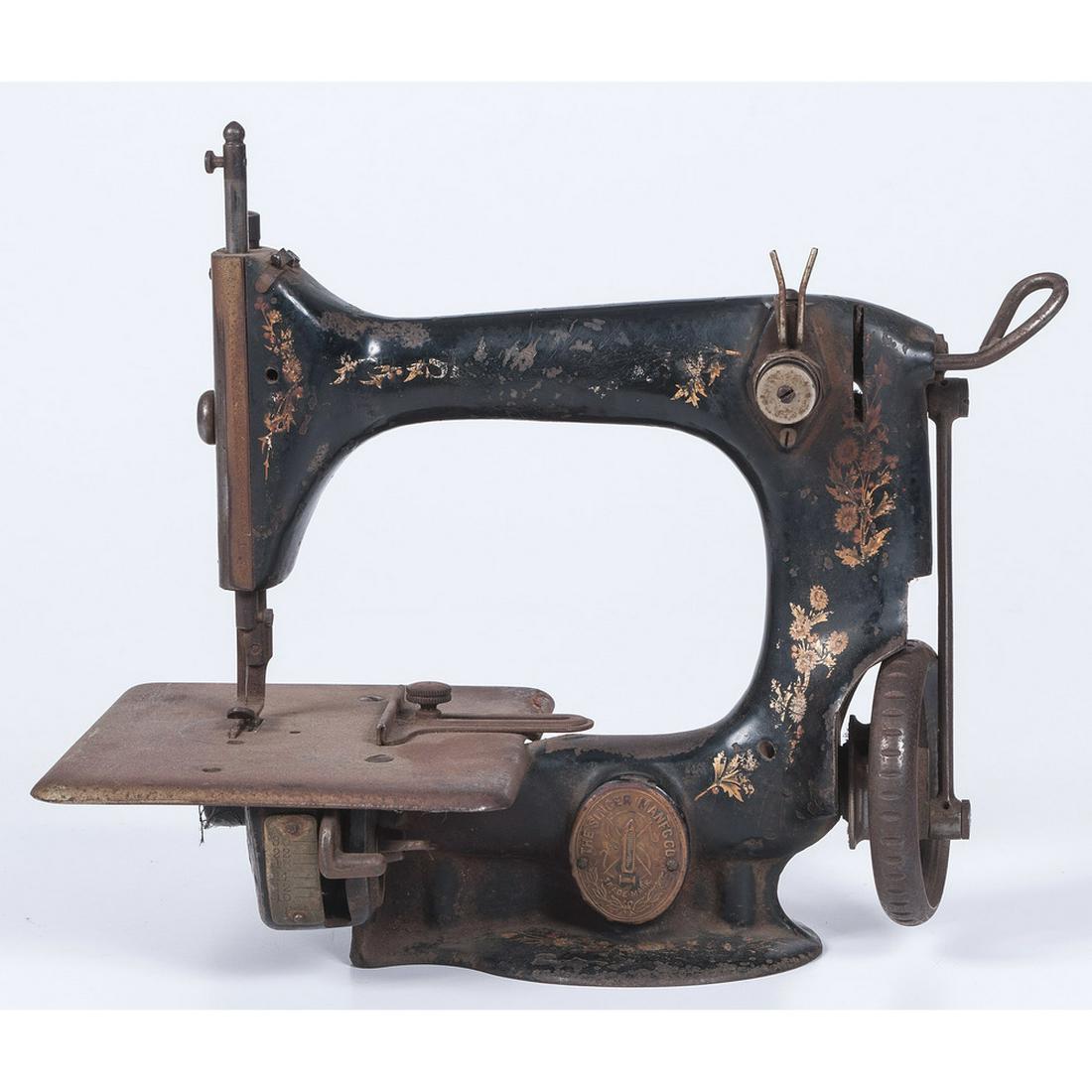 Singer Sewing Machine: American, ca 1903. A diminutive sewing machine, model 24 and serial number K1012803; ht. 8, lg. 10 in.