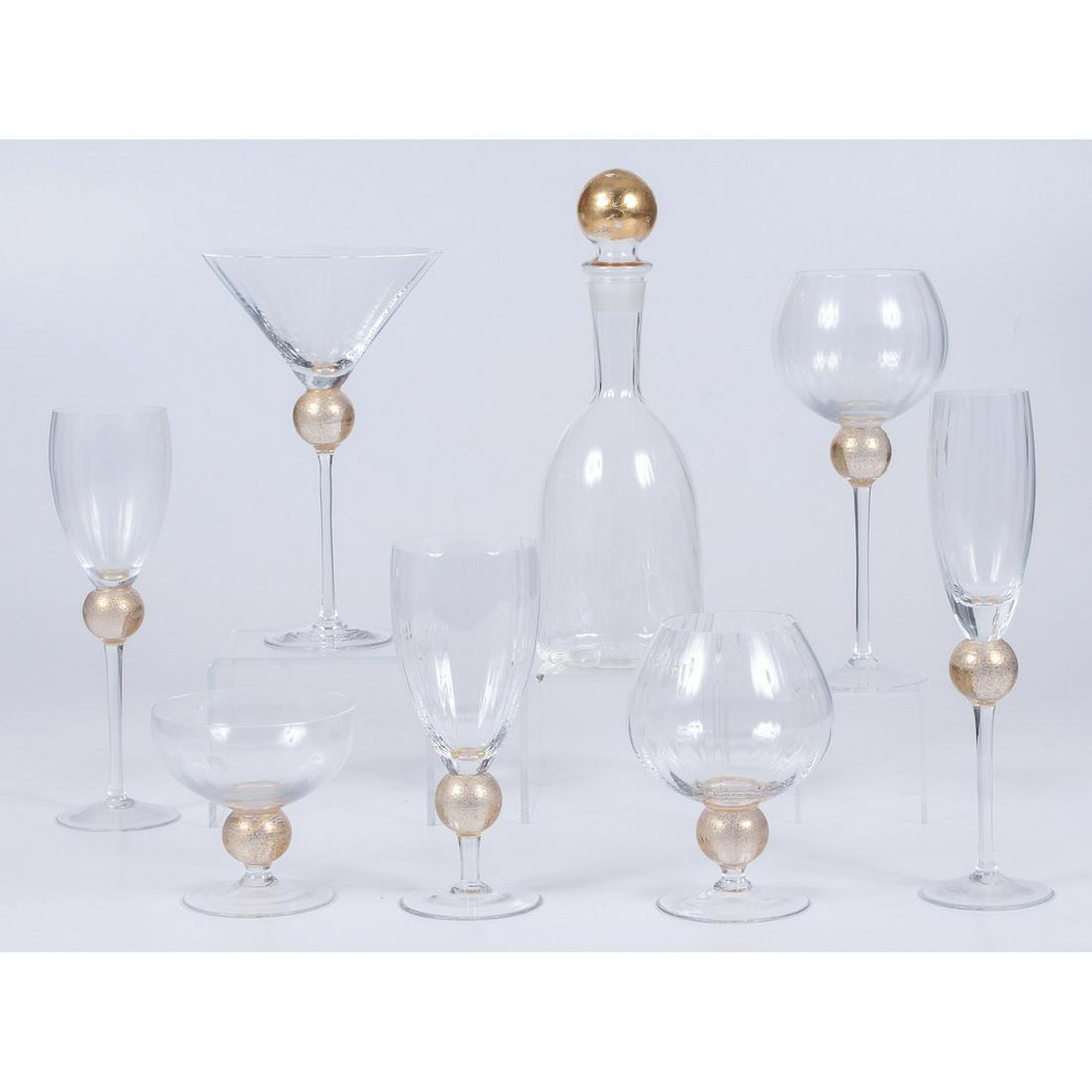 Union Street Glass Stemware: American. A collection of Union Street Glass stemware in the Manhattan pattern, forty-three pieces in total, including a decanter and six of each: wine glasses, Bordeaux glasses, champagne flutes, ice