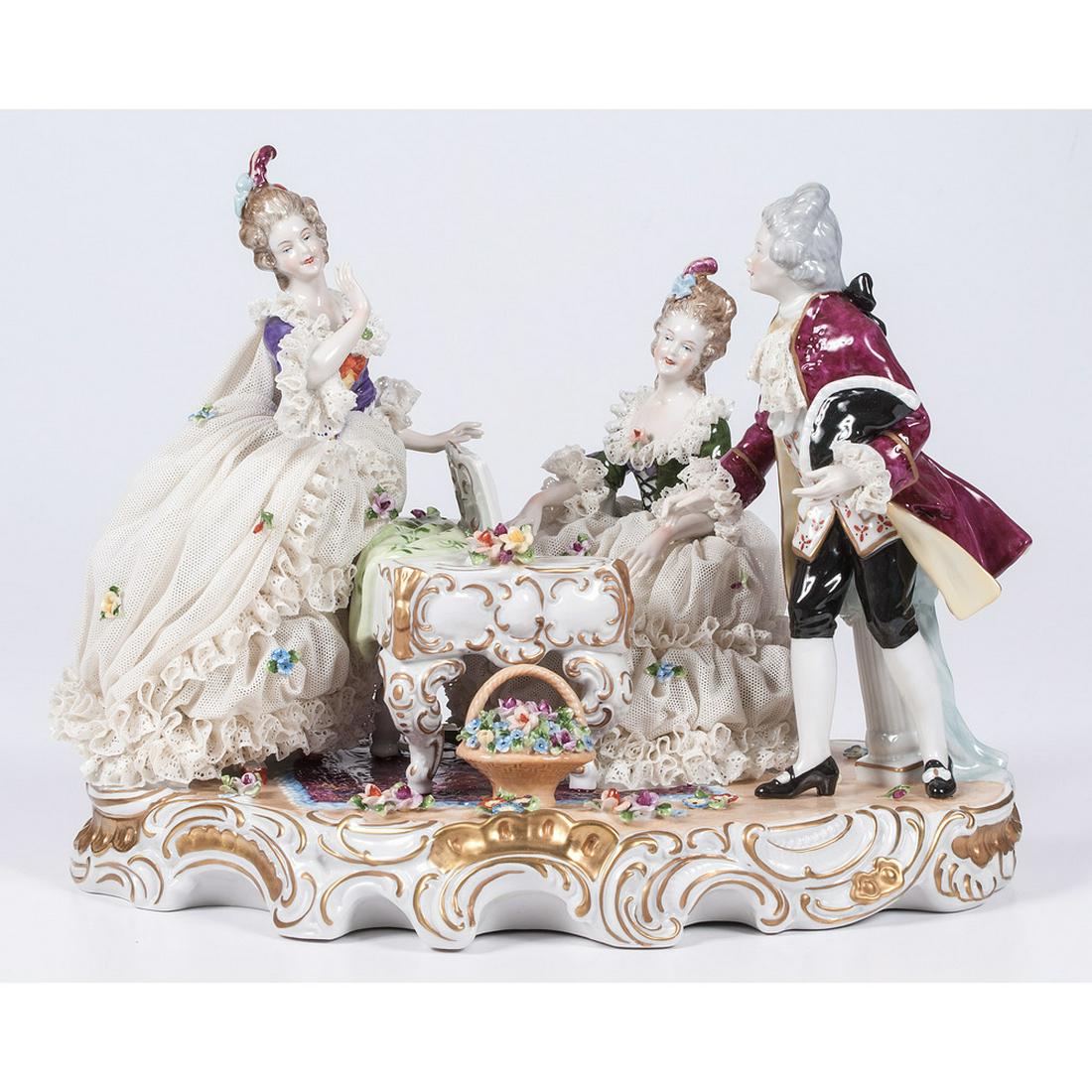 Unterweißbach Porcelain Figural Group: German, 19th-20th Century. A porcelain figural group on stand with a woman playing piano and others listening, with Unterweißbach mark and numbered 14 on bottom; ht. 10 in.