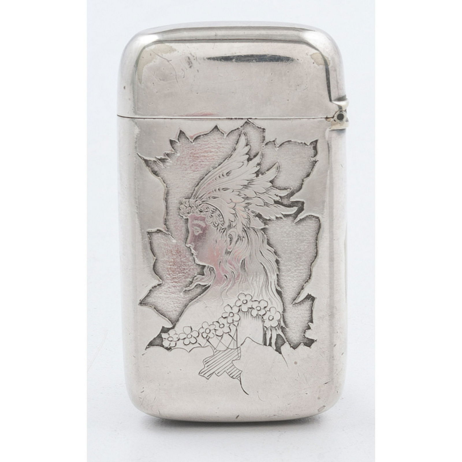 Pairpoint Silverplate Match Safe: American, late 19th-early 20th century. A Pairpoint silverplated match safe with decoration of a woman in a headdress to one side, monogrammed on the other, with strike to underside and marked on inte