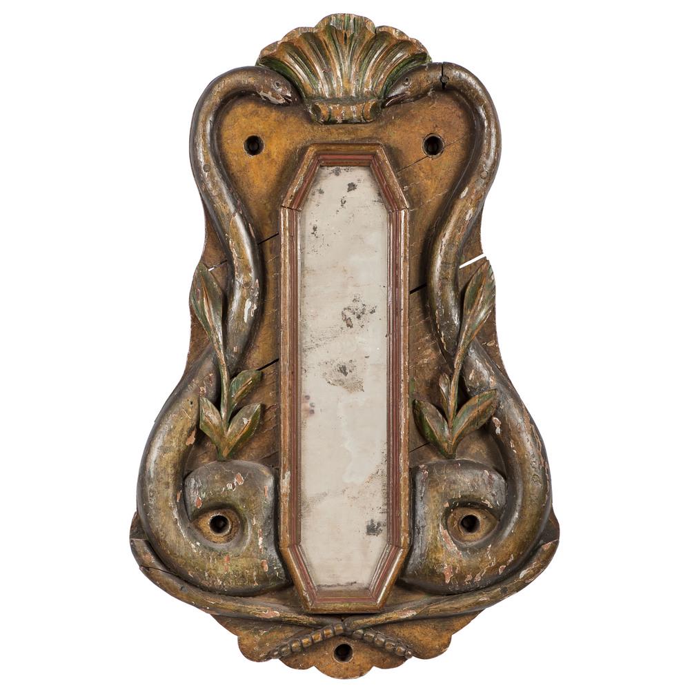 Folk Art Carved Snake Mirror: 20th century. A folk art carved and painted mirror with elongated octagonal mirror panel flanked by rattlesnakes. With old sockets and wiring for light; 34 x 22.5 in.