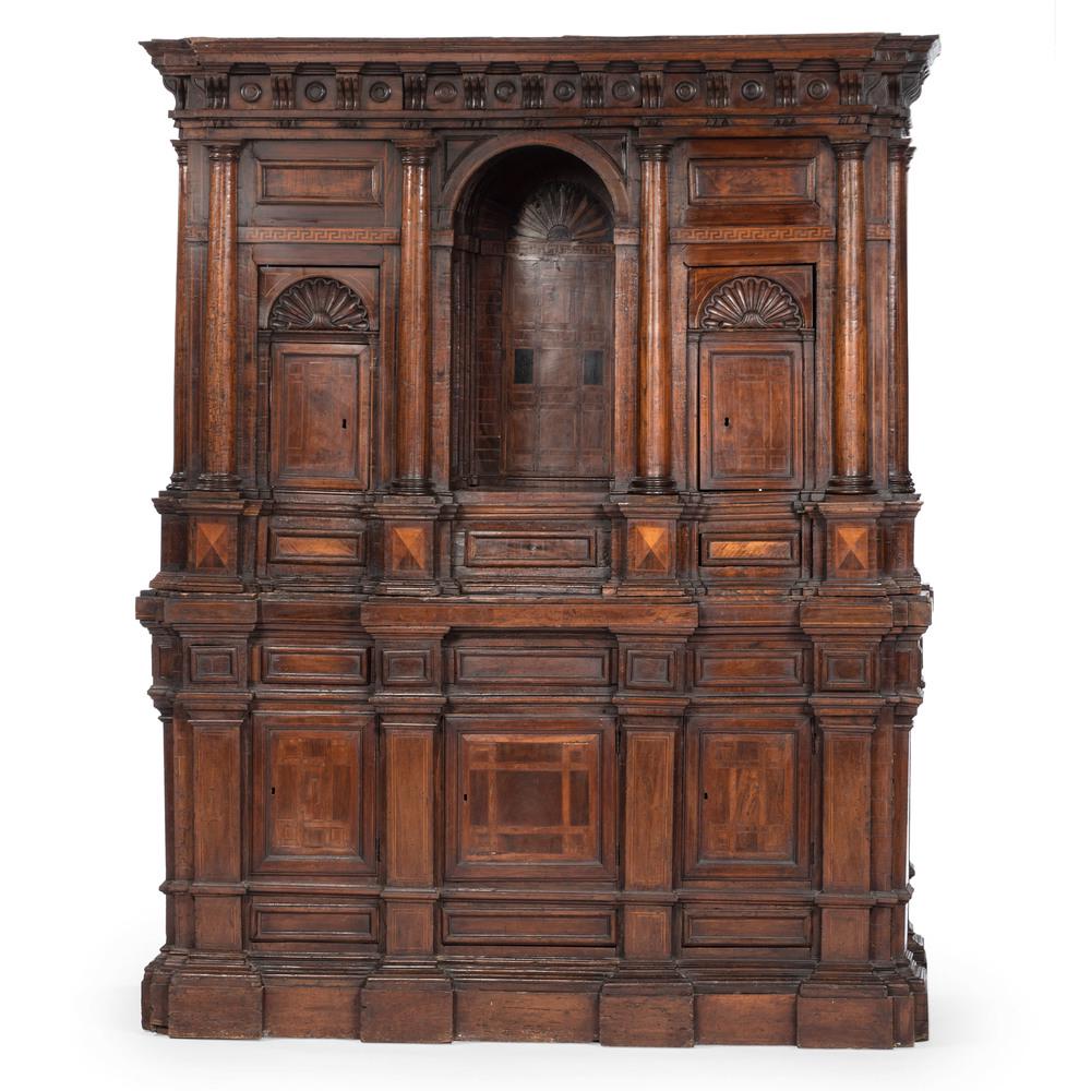 Italian Baroque Walnut and Marquetry Cabinet: Italian, 17th century. A two-piece cabinet in walnut with fruitwood marquetry, the upper case with molded cornice and Italianate dentil molded frieze, punctuated by engaged inlaid columns and having a