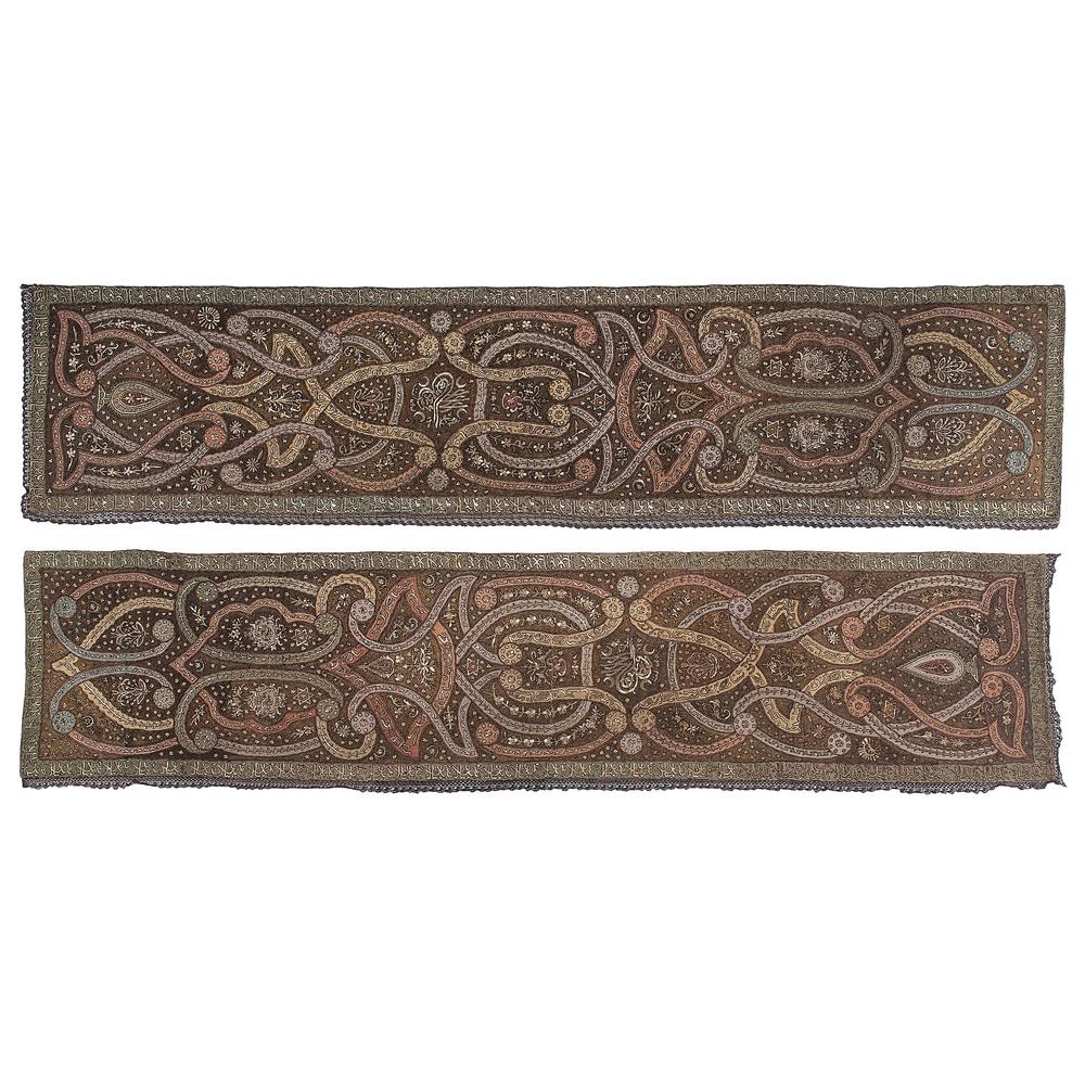 Pair of Large Turkish Ottoman Silk Embroidered Panels: Turkish, 19th century. A pair of silk hand-embroidered panels with metallic thread, decorated with Islamic motifs and stylized Arabic script, each with fringe on two sides; 120.5 x 27 in. (each). L