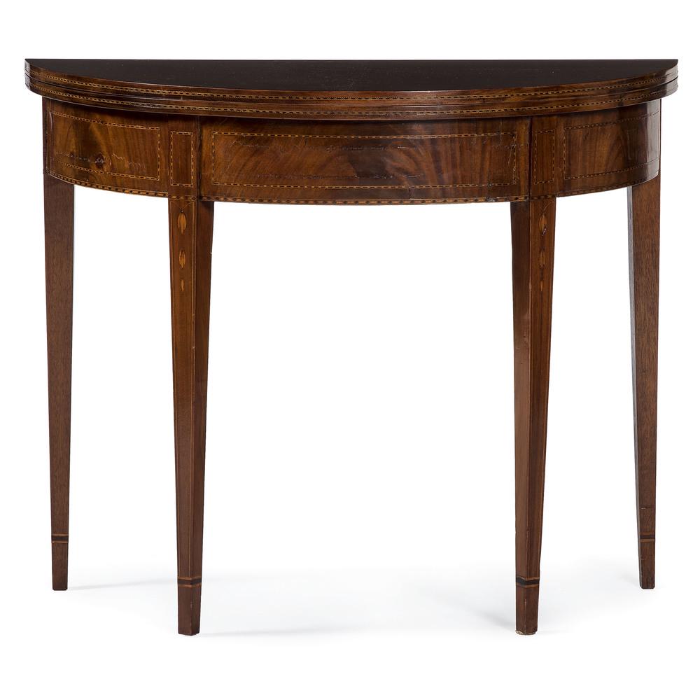 English Inlaid Game Table: English, 19th century. A Hepplewhite game table in mahogany, having a shaped fold out surface with swing leg support, the perimeter and apron with checker and diamond pattern inlay decoration, rising 