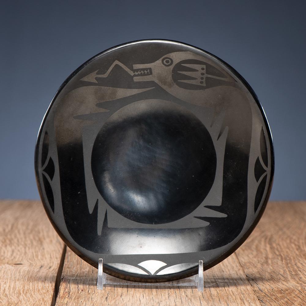 Maria Martinez and Popovi Da (San Ildefonso, 1887-1980/: painted with Avanyu, signed on base, diameter 6.25 in.Â Provenance: From the Stanley Slocum Collection, Minnesota