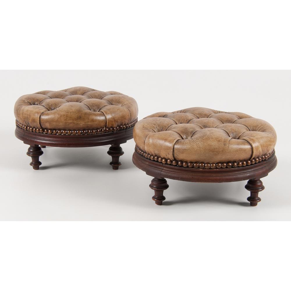 Pair English Leather Footstools: English, 19th century. A pair of round footstools with tufted leather cushions, each on four turned legs; ht. 5.75, dia. 11.25 in. Provenance: Property from Donald A. Rich Interiors and Antiques, Ne