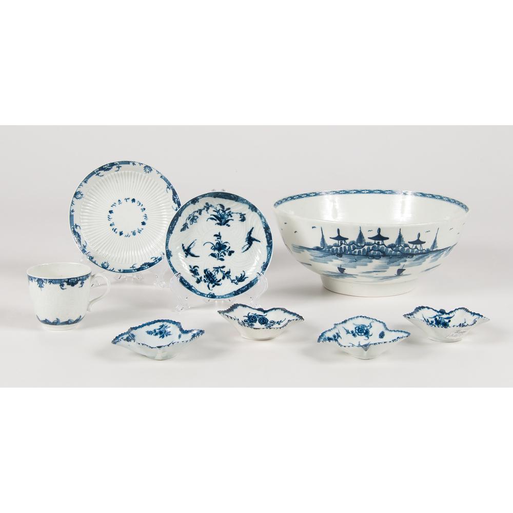 Worcester Dr. Wall Period Blue and White Porcelain: English, 18th century. Eight pieces of blue and white Worcester porcelain, including one saucer with feather molding and workman's mark, one rib molded saucer with crescent mark, one center bowl in "R