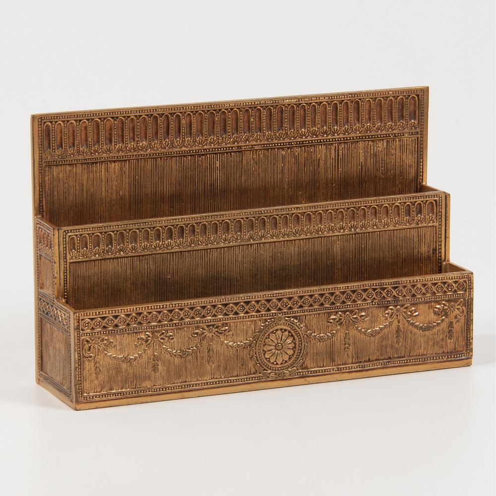 Tiffany Studios Paper Rack, "Adams" Pattern: American, early 20th century. A bronze paper rack by Tiffany Studios in the "Adams" pattern, impressed Tiffany Studios / New York / 1779 on underside; ht. 6, wd. 9.5, dp. 10.5 in.