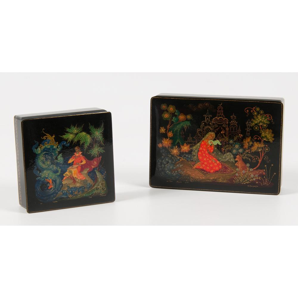 Russian Lacquer Boxes: Russian, 1970s. Two Russian lacquer boxes with painted story scenes and hinged lid, each signed by artist and dated 1974 and 1975, respectively; larger ht. 1.75, wd. 7, dp. 5 in.