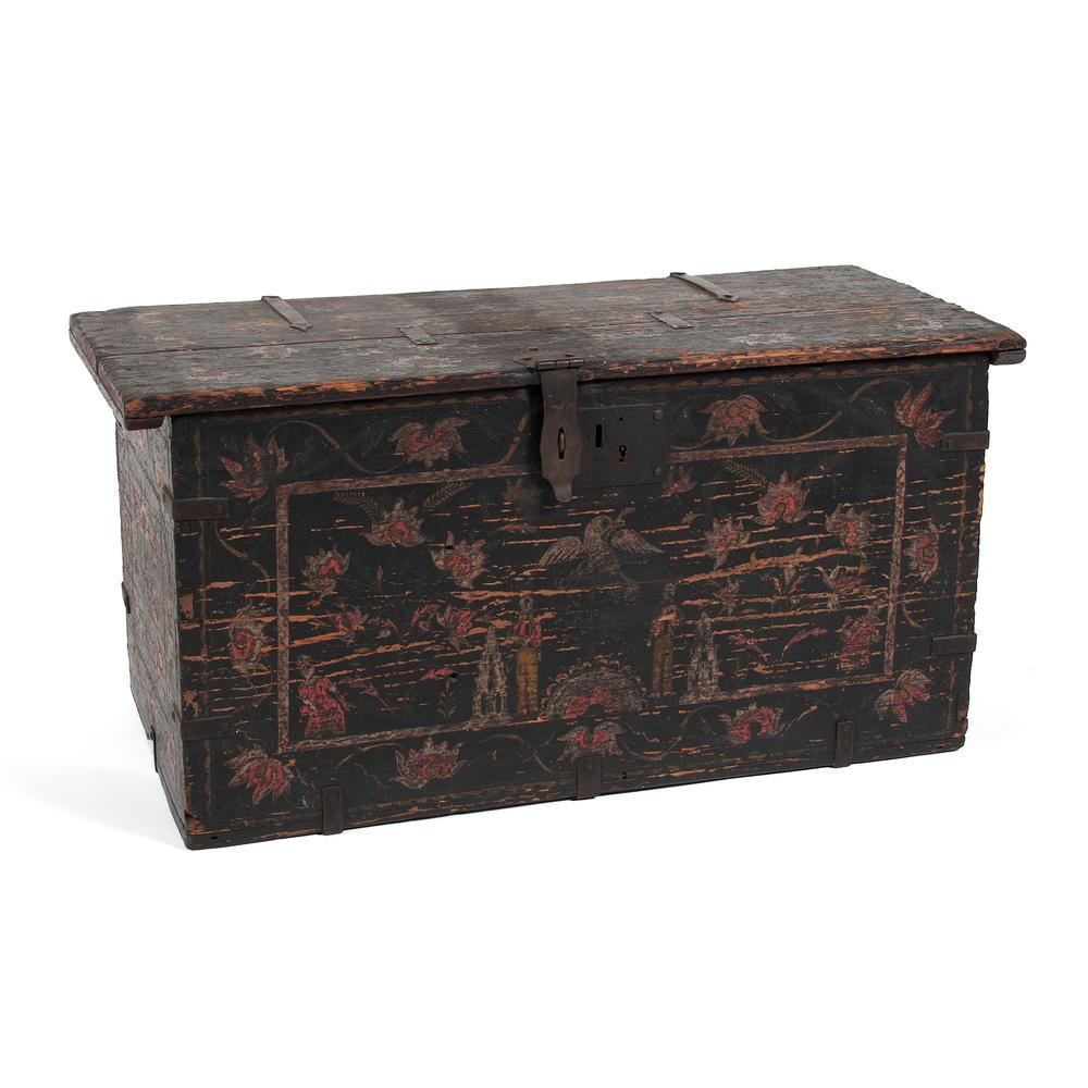 Continental Painted Blanket Chest: Probably Northern Europe, 19th century. A painted blanket chest in pine, with dark ground and overall floral motif, and front design of eagle flanked by figures and white buildings, and the case dovet