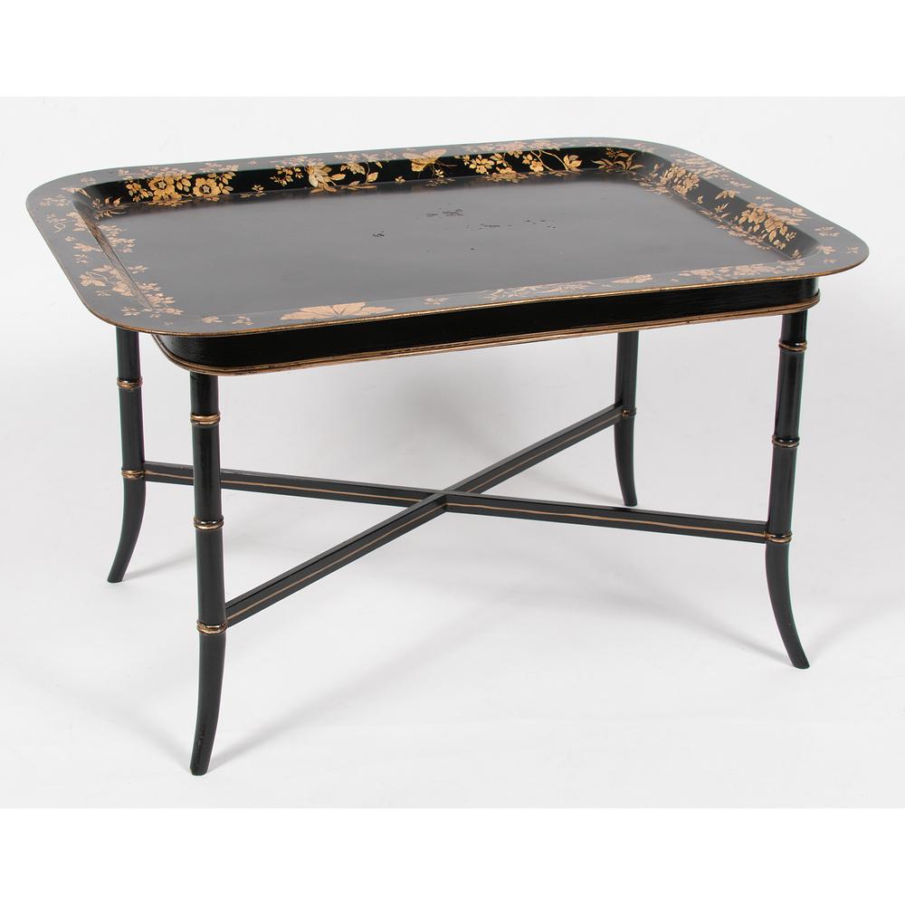 Toleware Tray on Stand: American, 19th century. A toleware tray of rectangular form, painted black with gold decoration of flowers and butterflies, resting on a painted bamboo turned wooden stand with four splayed feet and c