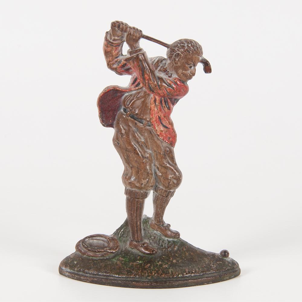 Hubley Cast Iron Doorstop, A Difficult Lie: American, late 19th-early 20th century. A painted cast iron doorstop by Hubley depicting a golfer taking a swing, impressed 238 on back; ht. 10, wd. 7.5, dp. 2.25 in. Provenance: Property from Donal