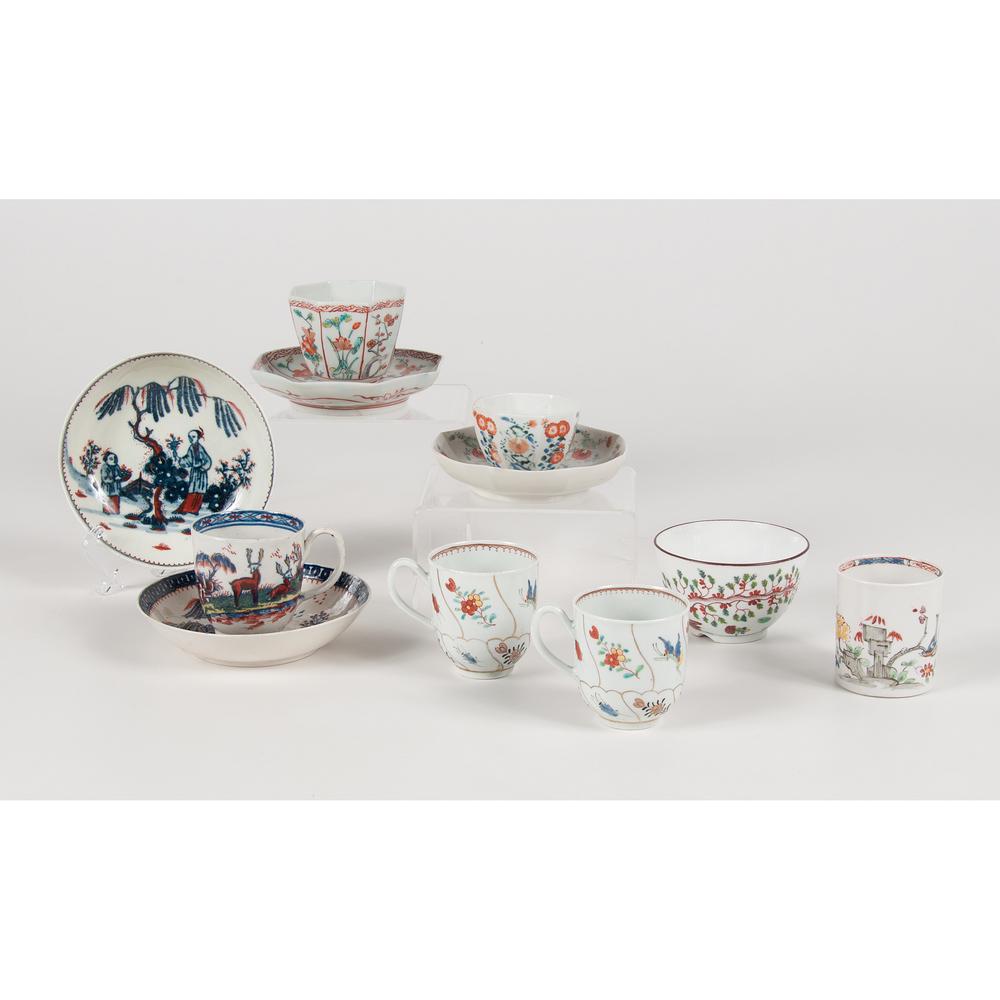 English Chinoiserie Teacups and Saucers: English. A group of eight teawares including, a Seth Pennington cup and saucer in deer pattern in iron red, cobalt and gilt, one Seth Pennington saucer with Chinese figures in iron red and cobalt with