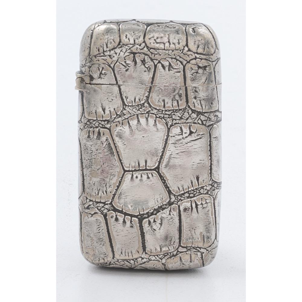Gorham Silverplate Alligator Match Safe: American, late 19th-early 20th century. A Gorham silverplate match safe with alligator skin motif to exterior, with strike to underside and marked on interior rim; ht. 2.5, wd. 1.5 in. Provenance: Pro