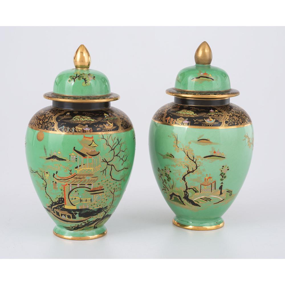 Carlton Ware Ginger Jars: Carlton Ware Ginger Jars English. A pair of Carlton Ware ginger jars, hand-painted with Asian motifs on a green ground, marks on underside; ht. 7 in. (each, with lids).