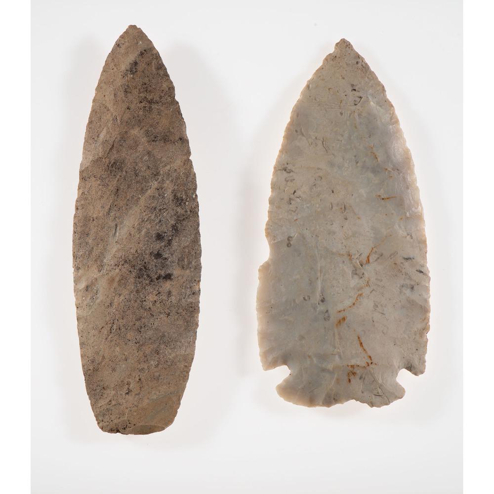 A Pair of Large Archaic Blades, Longest 5-1/2 in.: Archaic Period, 8000-500 B.C. Grand Traverse County, Michigan [F269] Wexford County, Michigan [D471] lot of 2, longest 5-1/2 in. Collection History Minnesota Historical Society Museum, St. Paul, Minne