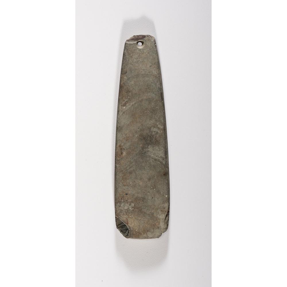 An Elongated Slate Pendant, 6 in.: Woodland Period, 800 B.C. - A.D. 1200 Unionville, Tuscola County, Michigan length 6 in. Collection History Unionville, Michigan Collection S.M. Callihan, Shepherd, Michigan Karl G. Parchert, Dearborn,