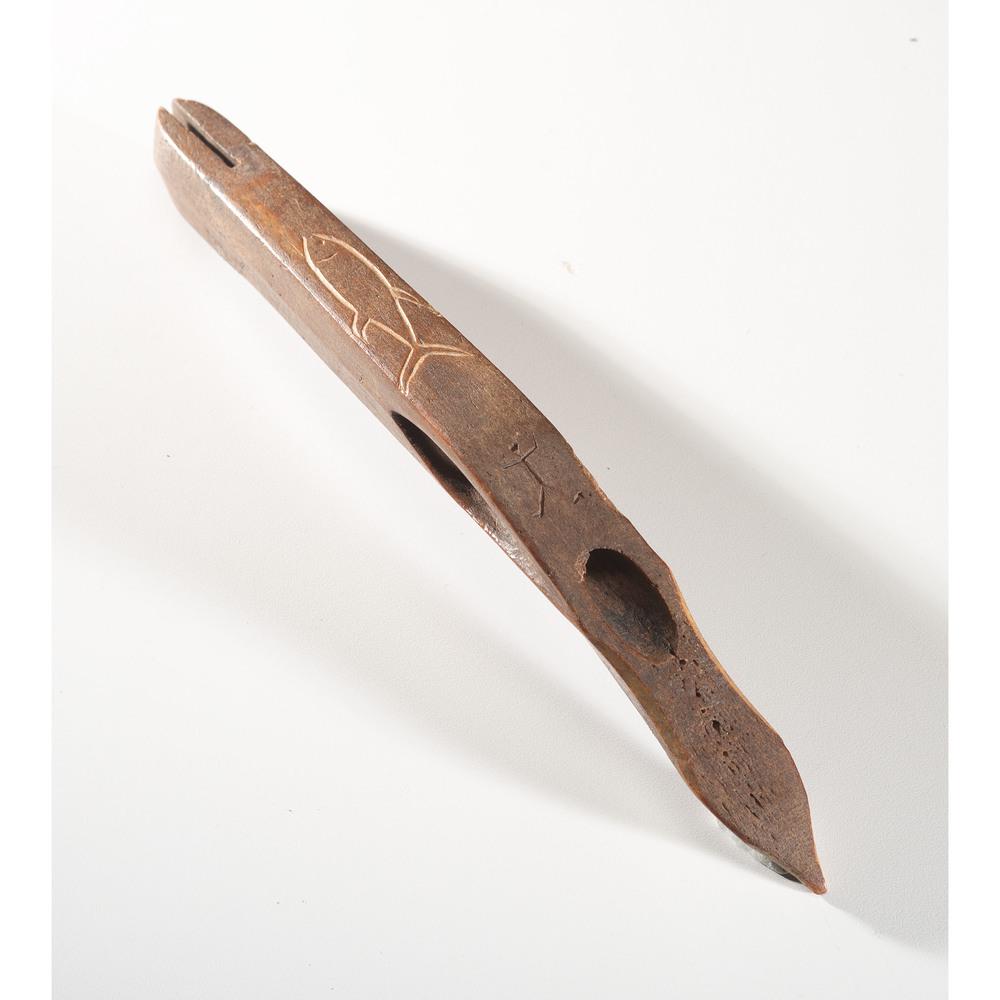 Inuit Bone Harpoon Foreshaft, Length 10-1/4 in.: carved of wood and depicting figural and fish reliefs; length 10-1/4 in. Collection History Collected by Norbert S. Hill in the Aleutian Islands in 1944 Newell E. Collins, Algonac, Michigan Karl G. P