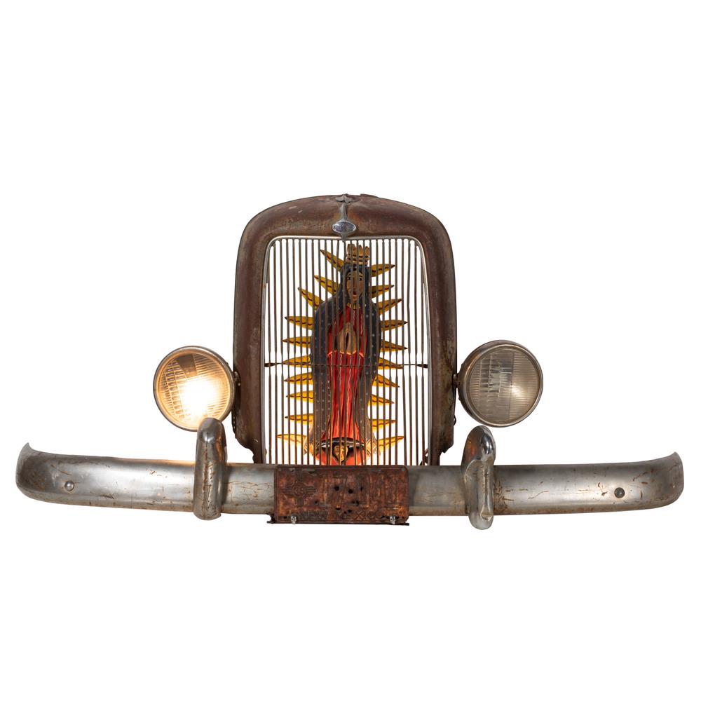 Nicholas Herrera (New Mexico, b. 1964) Multimedia: Nicholas Herrera (New Mexico, b. 1964) Multimedia Sculpture, From the Collection of Robert B. Riley, Urbana, IL La Virgen nos Guia por el Camino. (The Virgin Guides us Down the Road.) Ford grill, head