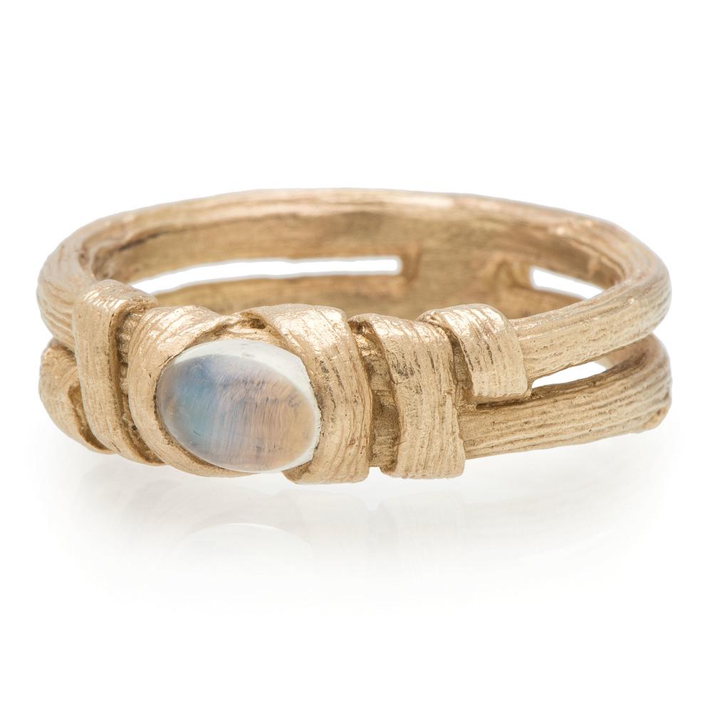 Charles Supplee (Hopi, b.1956) Attributed, 14k Gold and: Charles Supplee (Hopi, b.1956) Attributed, 14k Gold and Moonstone Ring gold band set with a moonstone in a wrapped setting; not marked, size 5.5, weight 3.6 dwt. late 20th century