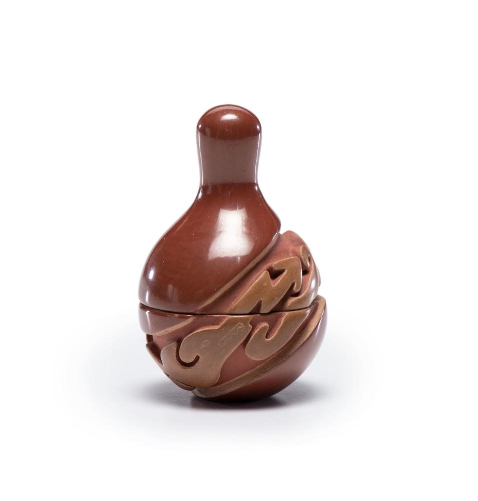 Nancy Youngblood (Santa Clara, b. 1955) Miniature Red: Nancy Youngblood (Santa Clara, b. 1955) Miniature Red and Sienna Carved Jar with Lid of globular form with bulbous lid and carved with image of Avanyu; signed and dated on base, height 2.75 in. x diam