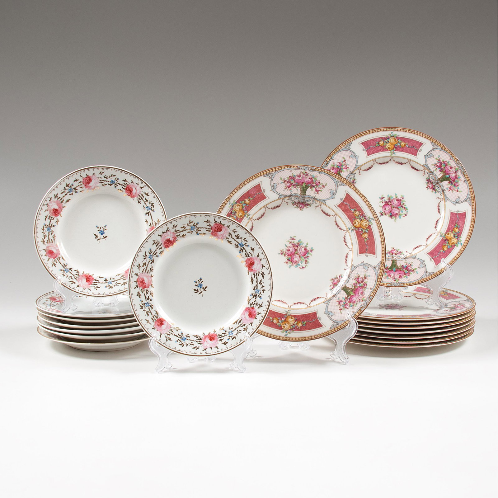 English Rose-Decorated Porcelain Plates, Including: English Rose-Decorated Porcelain Plates, Including Royal Crown Derby and Royal Worcester English, 19th-early 20th century. An assembled group of seventeen porcelain plates, including eight by Royal Cr