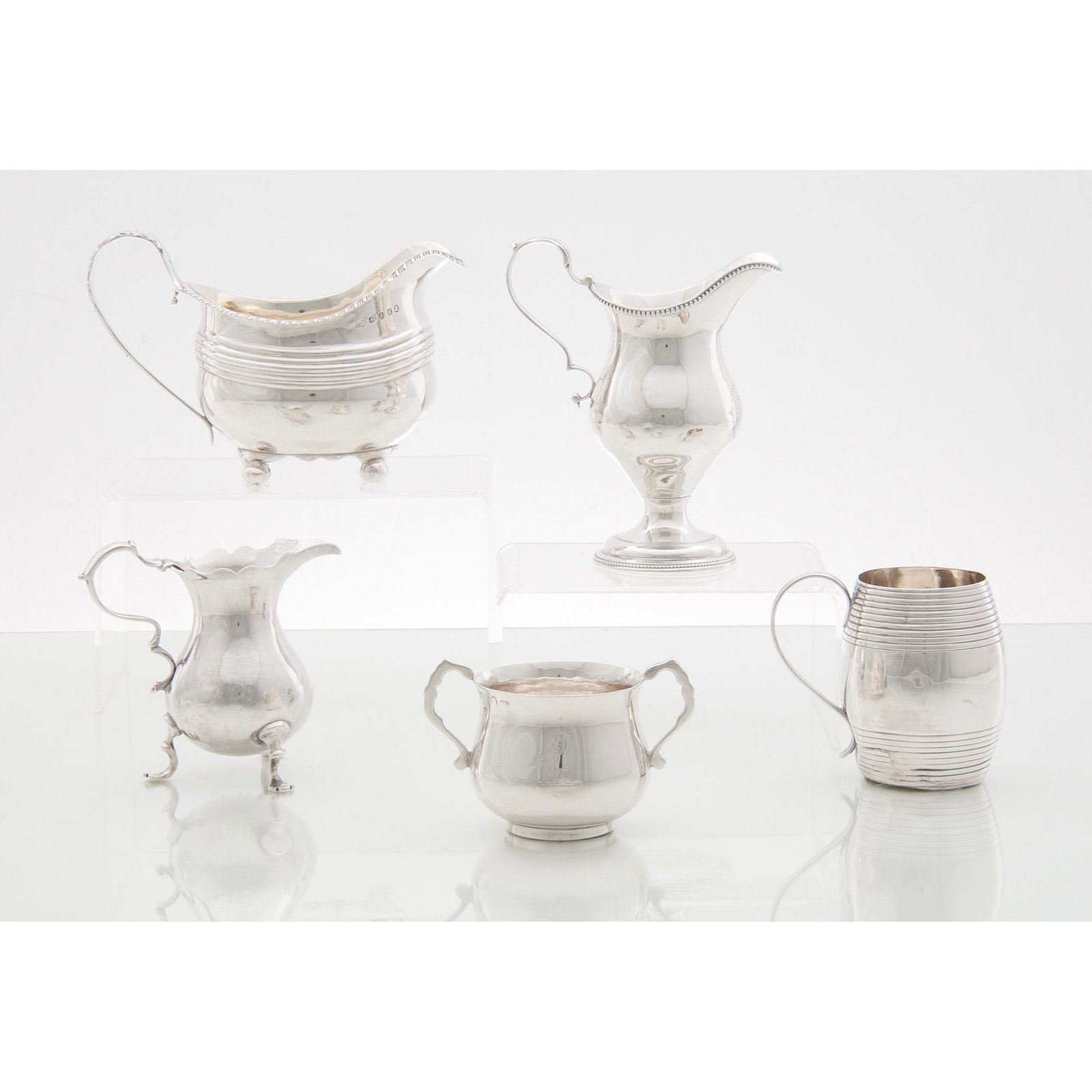 Georgian Sterling Hollowware, Plus: Georgian Sterling Hollowware, Plus English, late 18th-early 19th century. An assembled group of four sterling silver hollowware pieces, including one sauceboat marked RP with George III duty mark, one