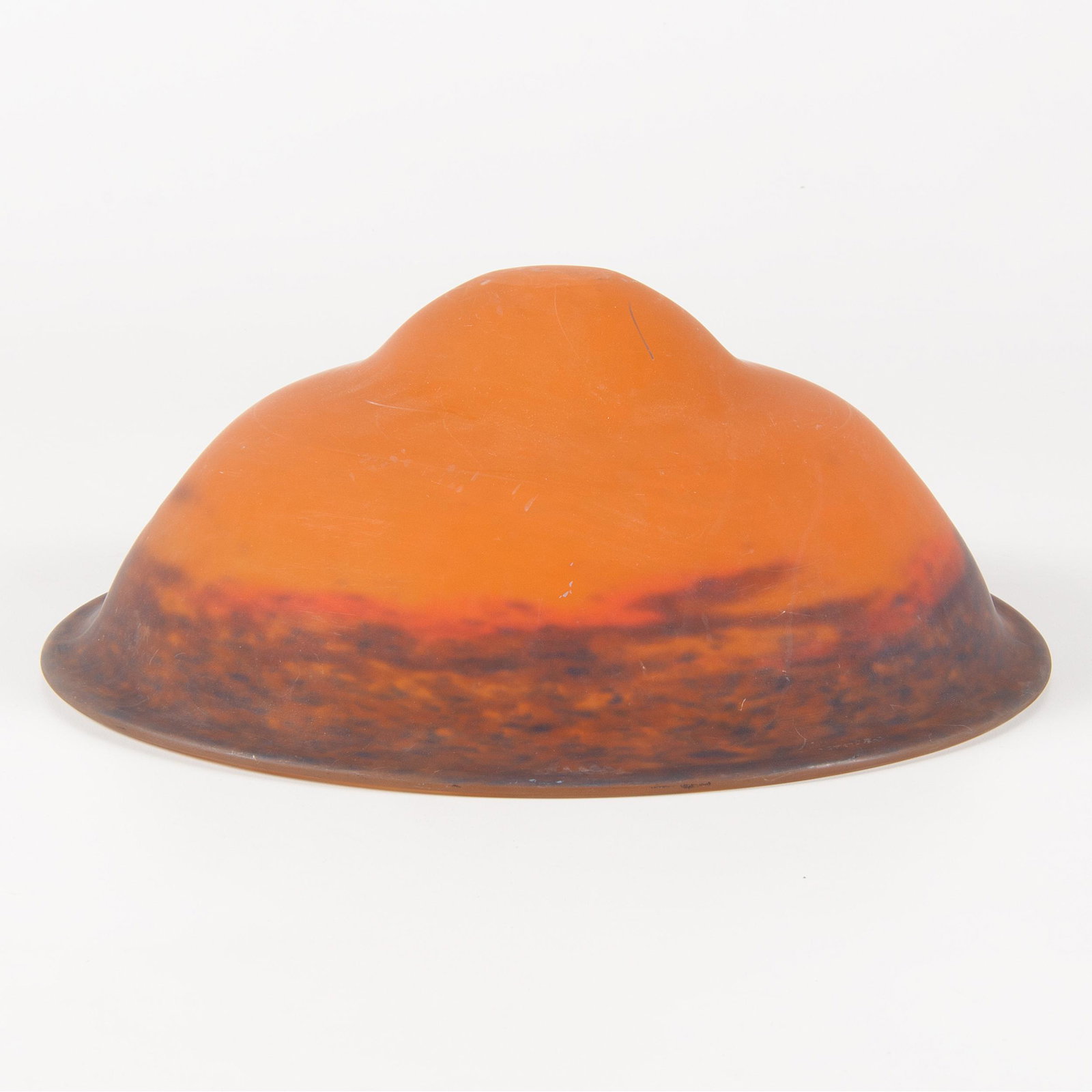 Muller Freres Lamp Shade, Luneville: Muller Freres Lamp Shade, Luneville French, early 20th century. A glass lamp shade by Muller Freres in the Luneville pattern in orange and dark blue, marked for maker and pattern on side; ht. 5.5, d