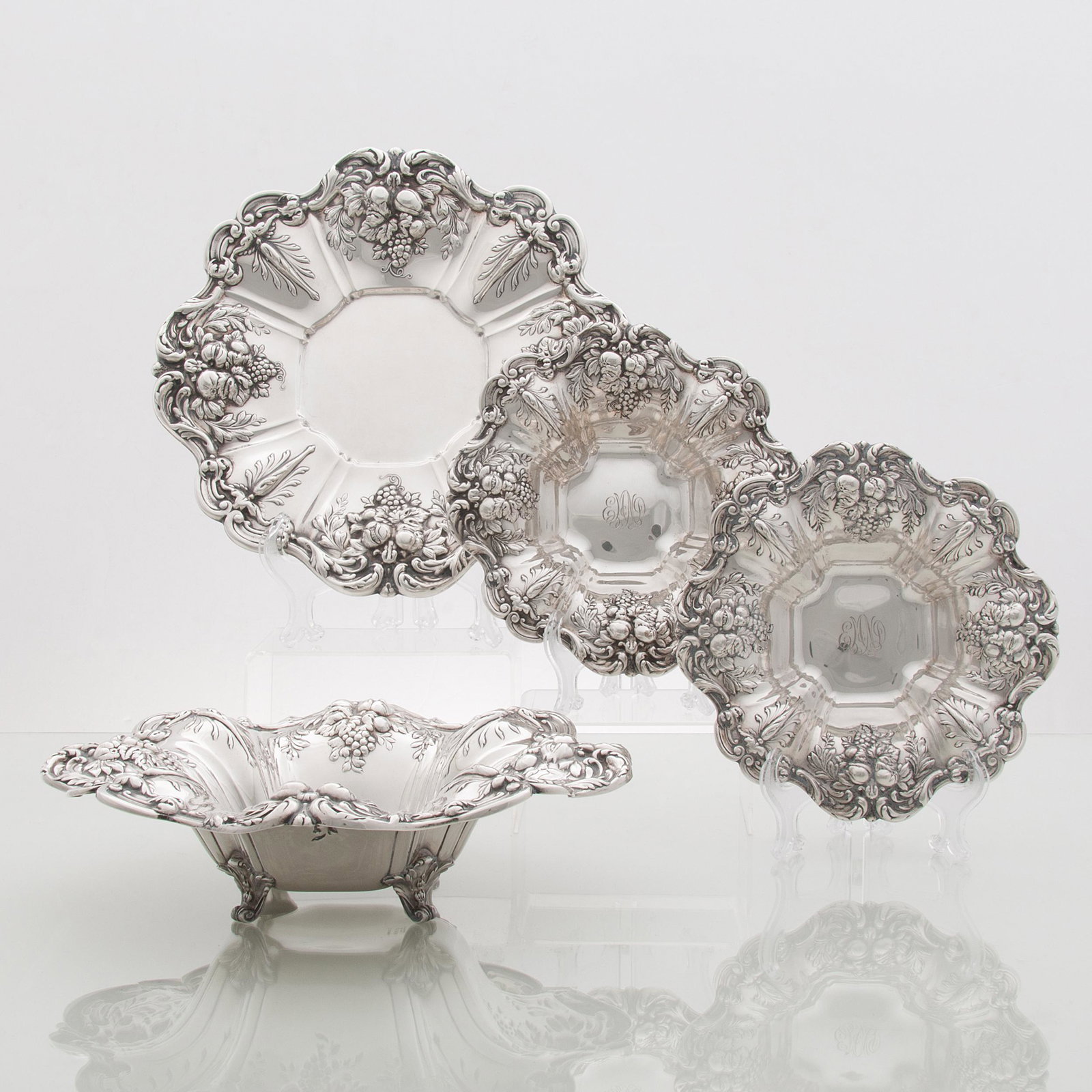 Cartier and Reed & Barton Sterling Hollowware,: Cartier and Reed & Barton Sterling Hollowware, Francis I American, 20th century. Four pieces of sterling hollowware in the Francis I pattern, including two bowls by Cartier, and one plate and one cent