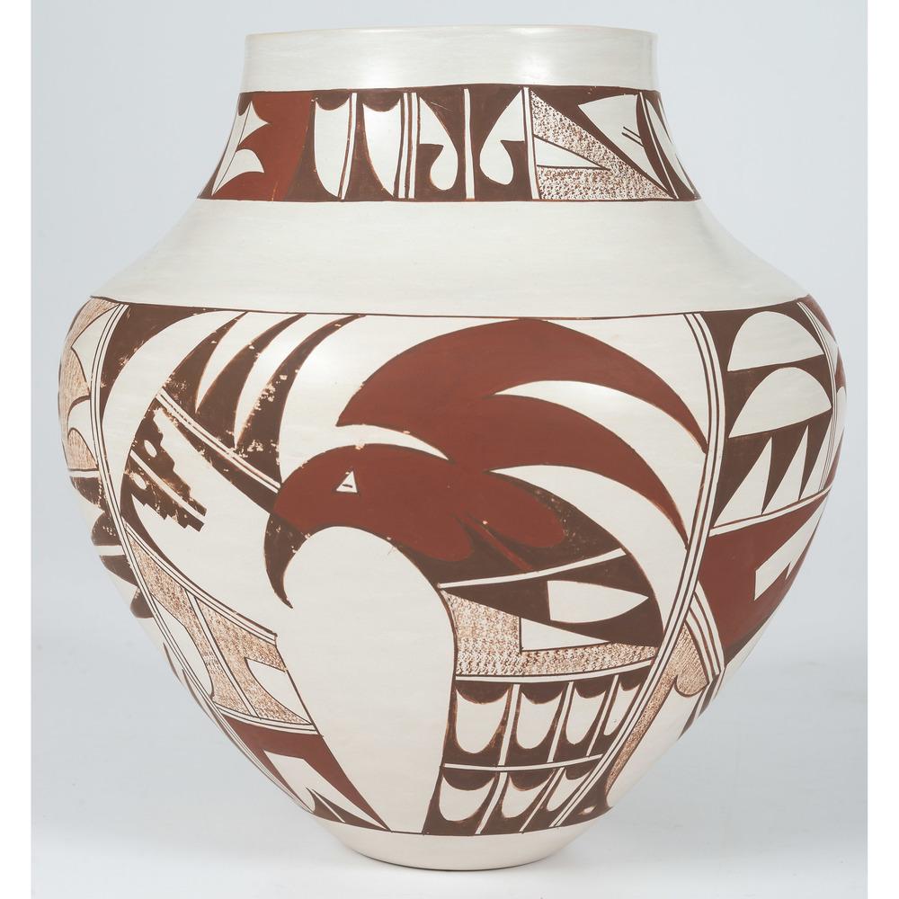 Joy Navasie, Second Frog Woman (Hopi, 1919-2012): Joy Navasie, Second Frog Woman (Hopi, 1919-2012) Pottery Jar painted with a parrot and stylized avian motifs; signed on base, height 10.25 in. x diameter 9.5 in. third quarter 20th century