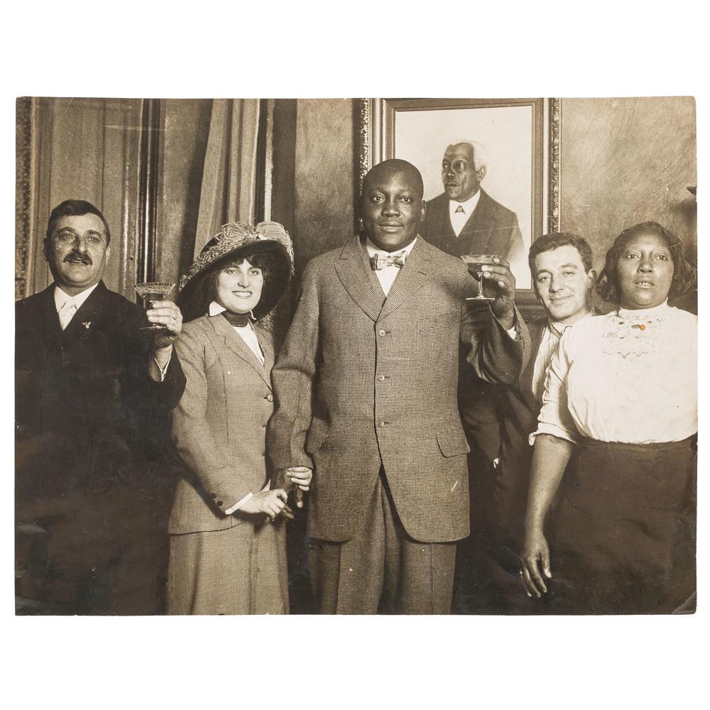 Jack and Lucille Johnson Oversize Wedding Photograph,: Jack and Lucille Johnson Oversize Wedding Photograph, 1912 Oversized photograph taken at the wedding of Jack Johnson and wife Lucille, December 4, 1912. 8.8 x 6. 75 in. (225 x 174 mm). A photograph ta