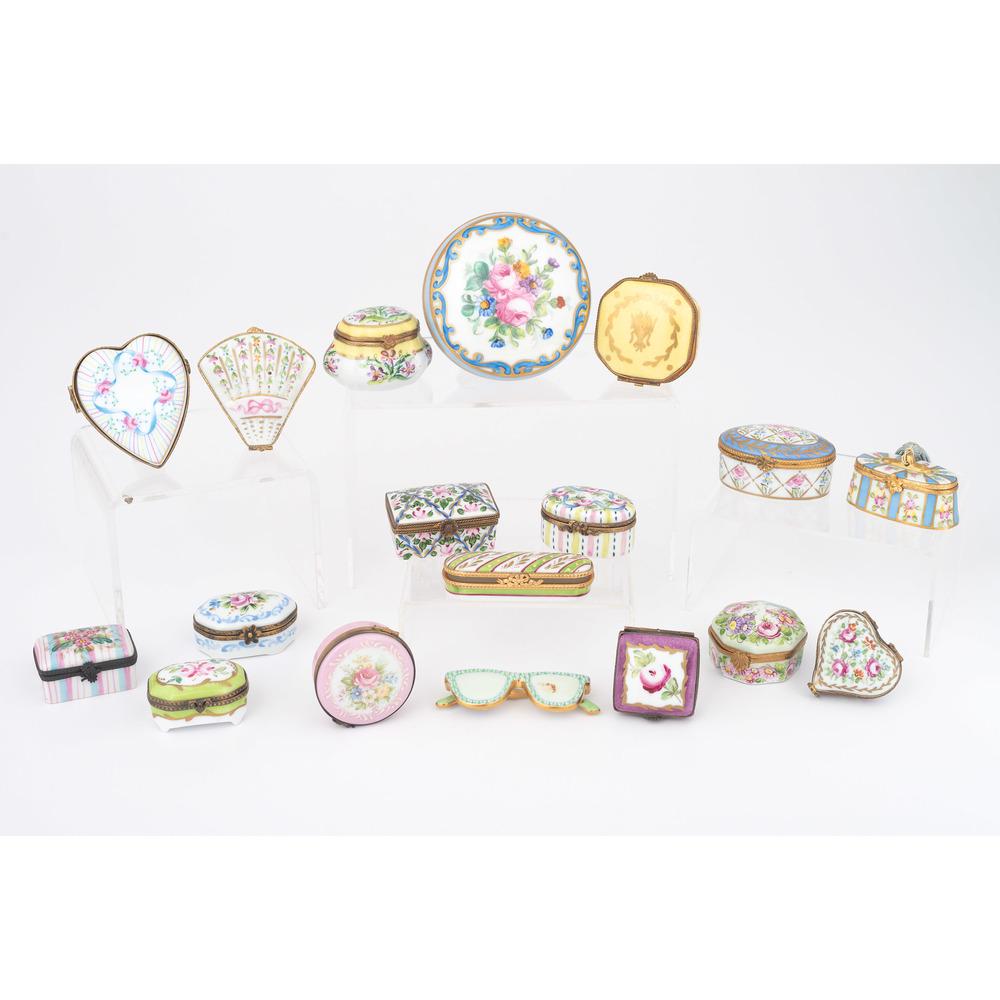 Limoges Trinket Boxes, Plus: Limoges Trinket Boxes, Plus 20th century. Seventeen Limoges porcelain hand-painted trinket boxes in various shapes, each marked, PLUS a Herend sunglasses figurine; largest box ht. 1.75, dia. 4 in.