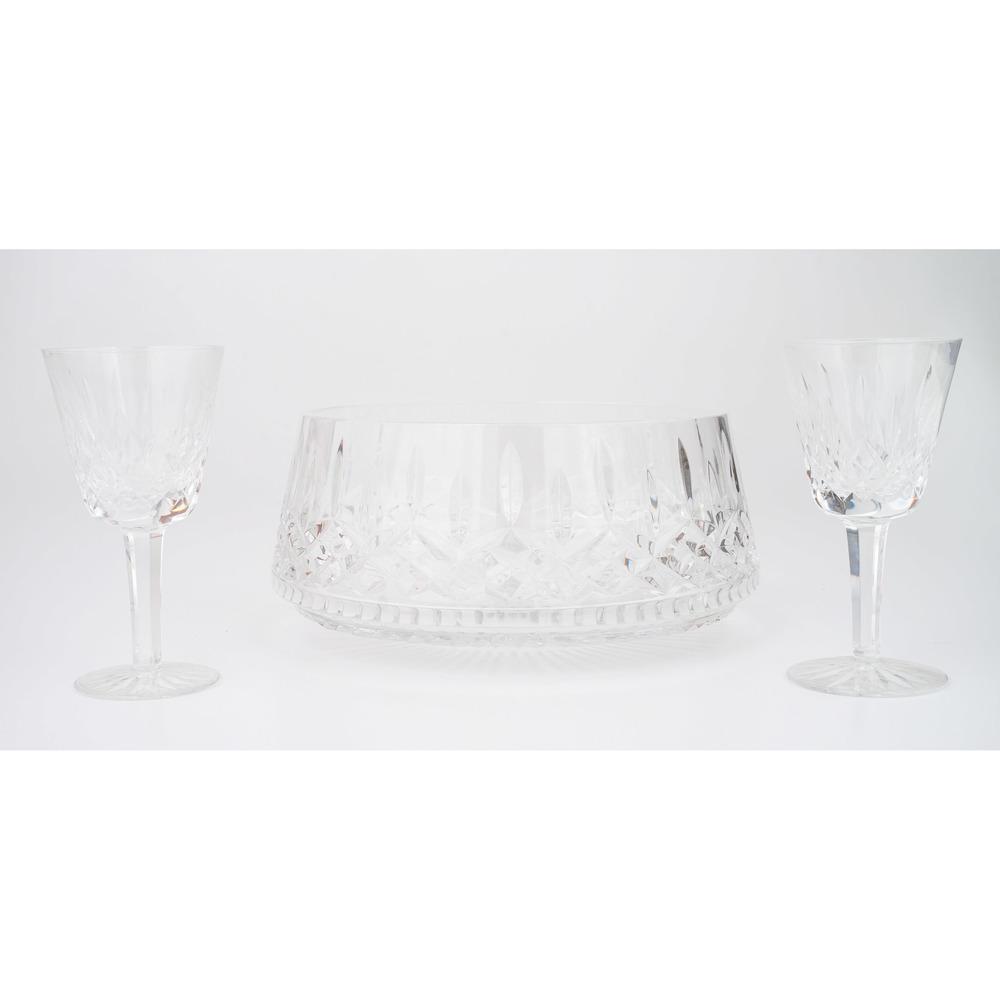 Waterford Crystal Center Bowl and Glasses: Waterford Crystal Center Bowl and Glasses Irish. A Waterford center bowl and seven wine glasses, all with etched mark; bowl ht. 4.5, dia. 8.5 in., glass ht. 5.75 in. (each).