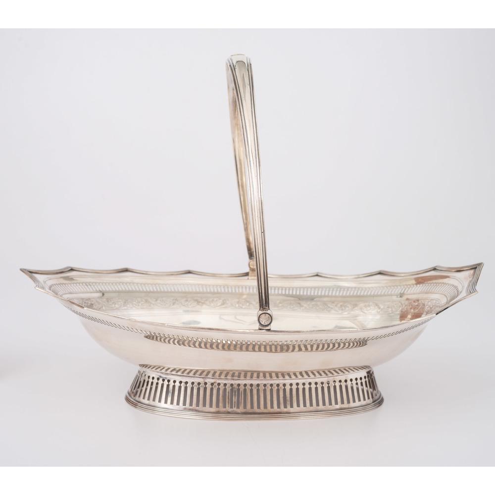 George III Sterling Bread Basket, Likely Robert Hennell: George III Sterling Bread Basket, Likely Robert Hennell English, ca 1793. A sterling silver basket with pierced foot and rim, and engraved decoration. With full hallmarks to rim and partial marks to s