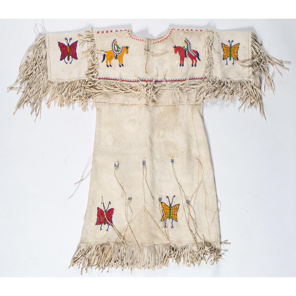 Northern Plains Beaded Hide Girl's Dress, with Horses: thread-sewn and beaded with eight butterflies and four horses in colors of yellow, red, blue, and green; fringed detailing, length 36 in. x chest 36 in. second quarter 20th century