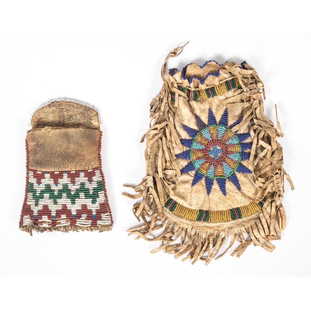 Central Plains Beaded Hide Bags: lot of 2, includes a beaded hide bag with green pigment and beaded in colors of blue, green, white, and red, length 4.5 in. x width 4 in.; PLUS hide bag with hide fringe, beaded with a sun medallion