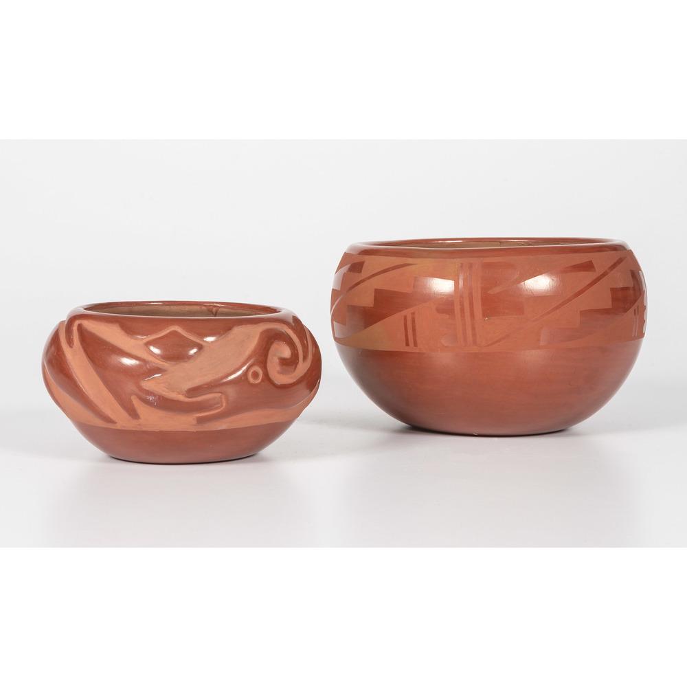 Juanita Gonzales (San Ildefonso, 1909-1988) Redware: lot of 2, includes a painted bowl with repeating geometric motif, signed on base, height 4.25 in. x diameter 7 in.; AND a carved bowl with Avanyu, signed on base, height 3 in. x diameter 6 in. mid-20